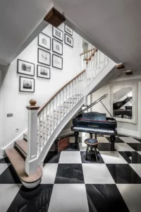 This image shows dramatic hallway of Henley House which is part of the Traditional Build range from English Brothers